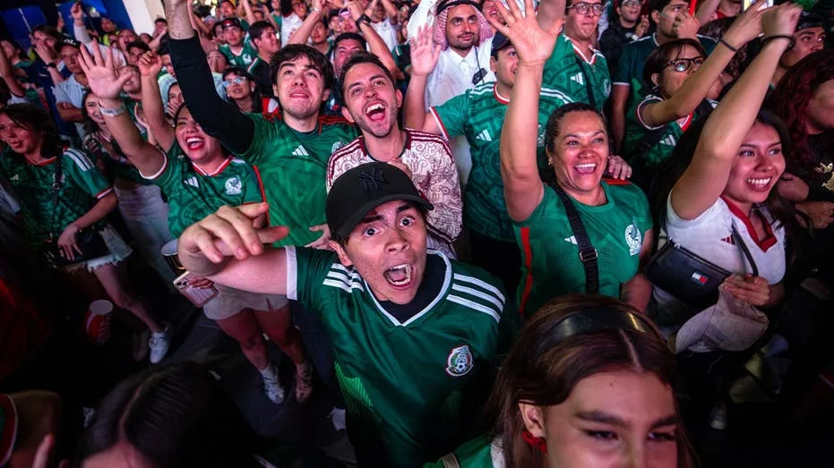 Mexican Soccer Fans Mark World Cup Advancement with Energetic Street Boxing Celebration