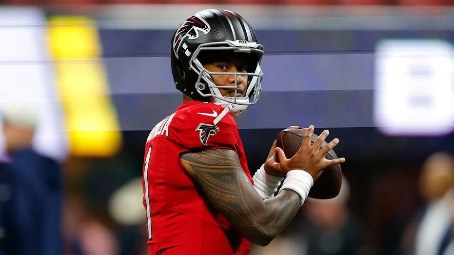 Michael Penix Jr. Emerges as Frontrunner for Falcons' Starting Quarterback Amid Tua Tagovailoa's Camp Struggles